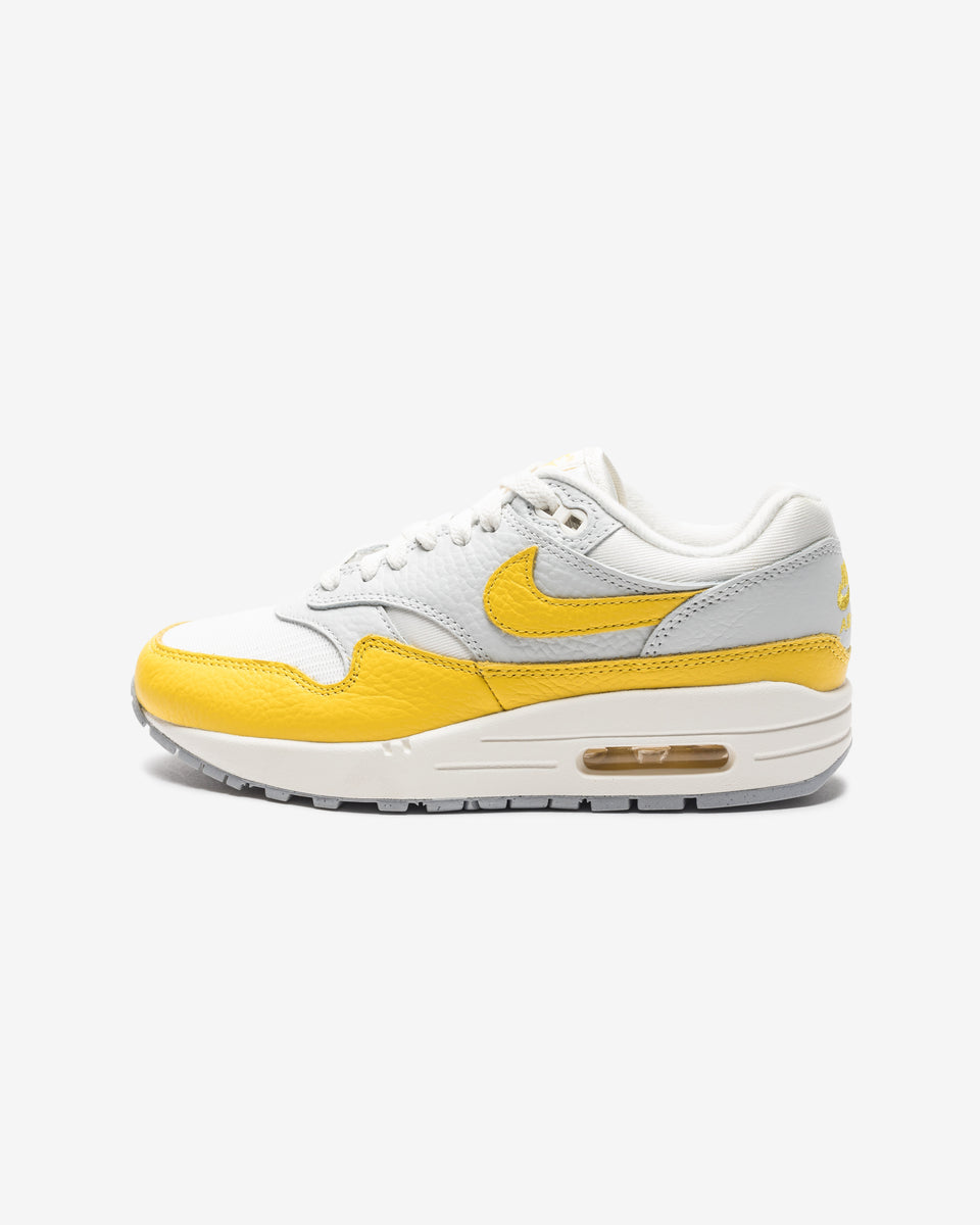 NIKE WOMENS AIR MAX 1 - PHOTONDUST/ TOURYELLOW/ GREY â Undefeated