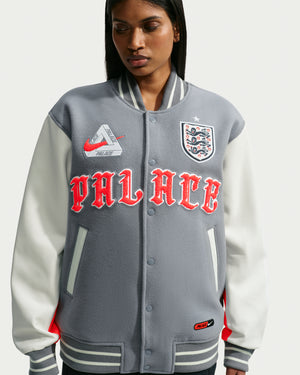 NIKE X PALACE ENG VARSITY JACKET - PEWTER GREY – Undefeated