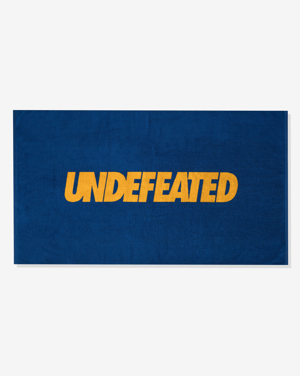 UNDEFEATED LOGO BEACH TOWEL – Undefeated