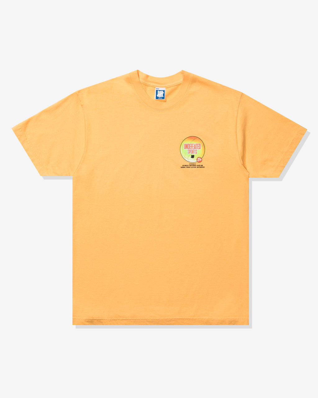 UNDEFEATED ADVERTISEMENT S/S TEE - WARM APRICOT