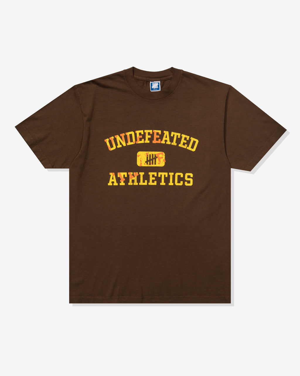 UNDEFEATED MISPRINT S/S TEE - BROWN