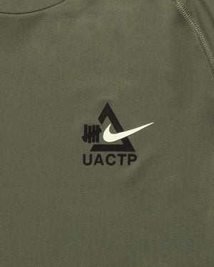 UACTP X NIKE NRG DF SLIM SS TOP - MEDIUM OLIVE – Undefeated