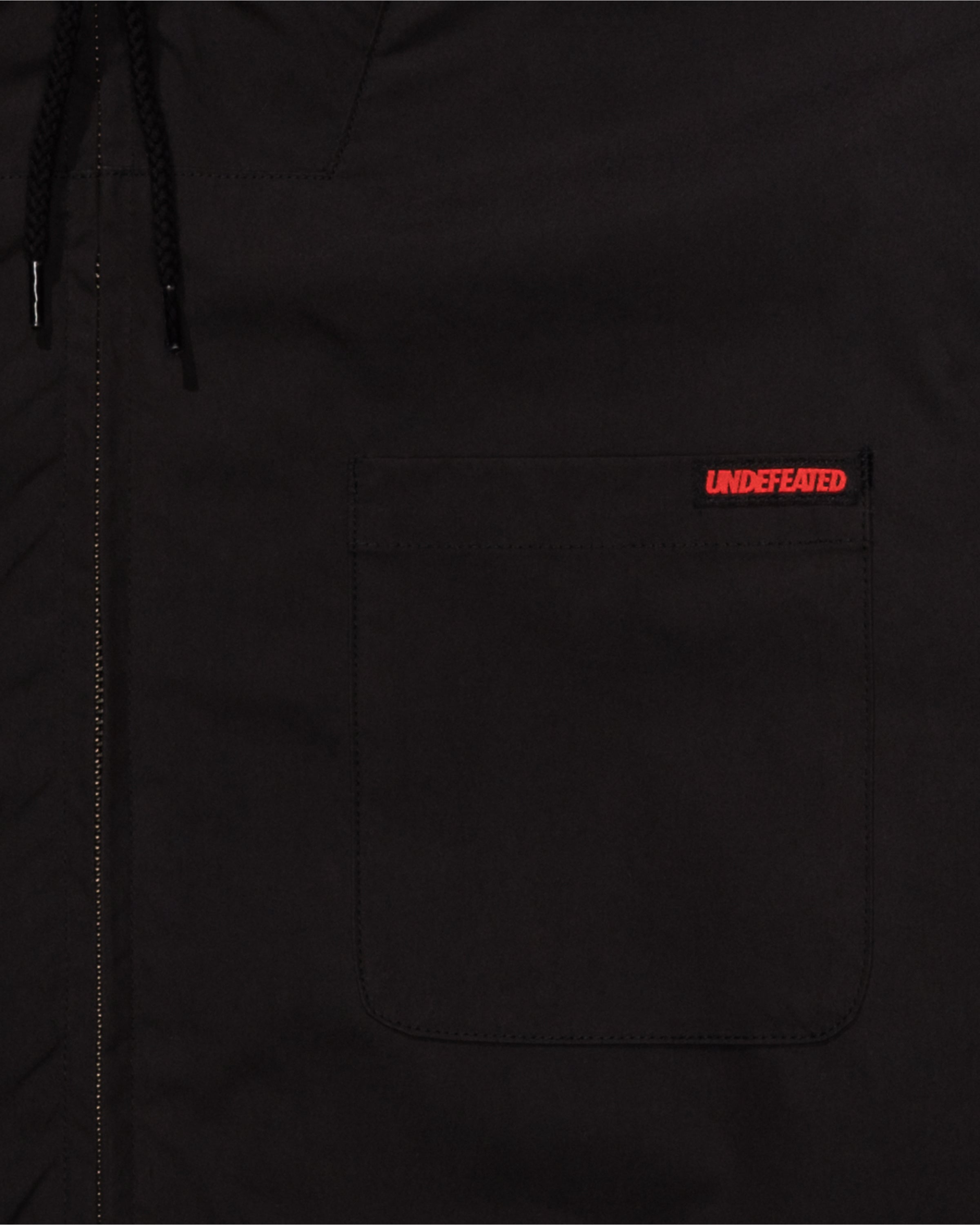 UNDEFEATED HOODED LIGHTWEIGHT WOVEN JACKET - BLACK