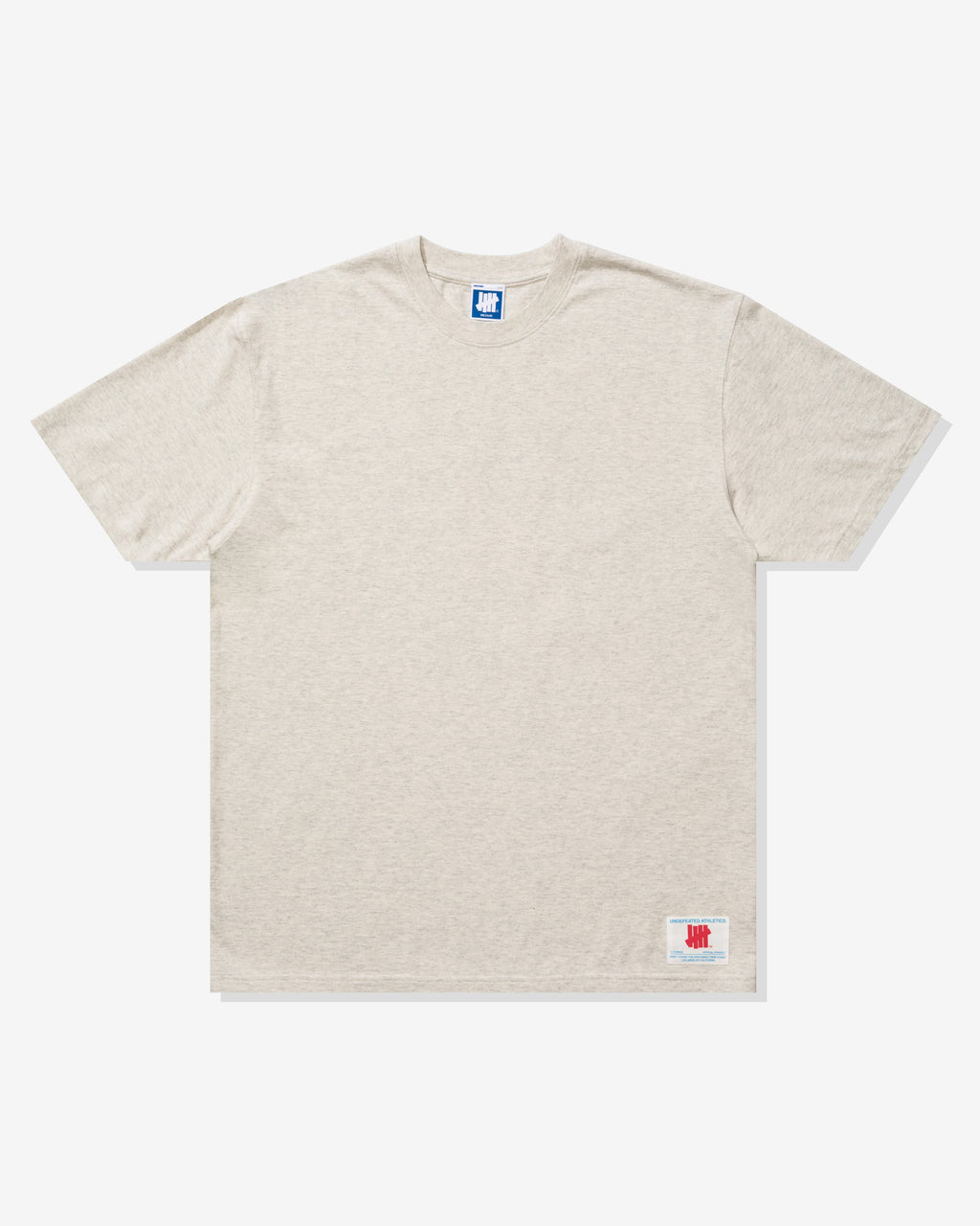 UNDEFEATED LOCKER LABEL S/S TEE - HEATHER OATMEAL