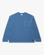 BLUE::A blue Undefeated Pigment Dye L/S Pocket tee on a white background.