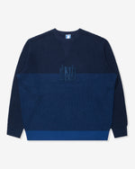 BLUE::A navy and blue Undefeated Waffle Sweater on a white background.