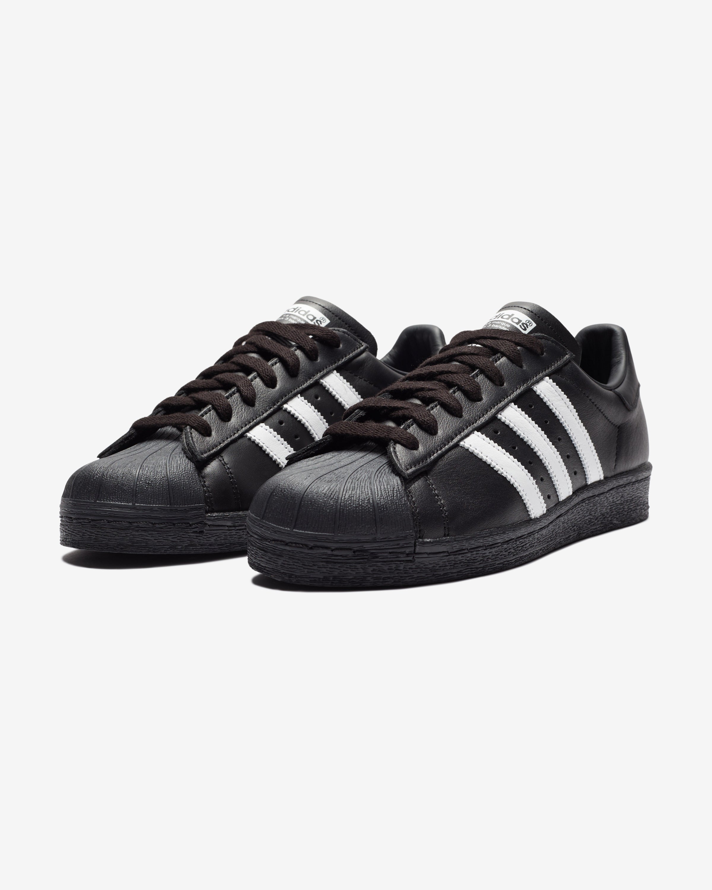 ADIDAS SUPERSTAR 82 CBLACK FTWWHT Undefeated