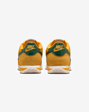 NIKE WOMEN'S CORTEZ TEXTILE - YELLOWOCHRE/ GORGEGREEN