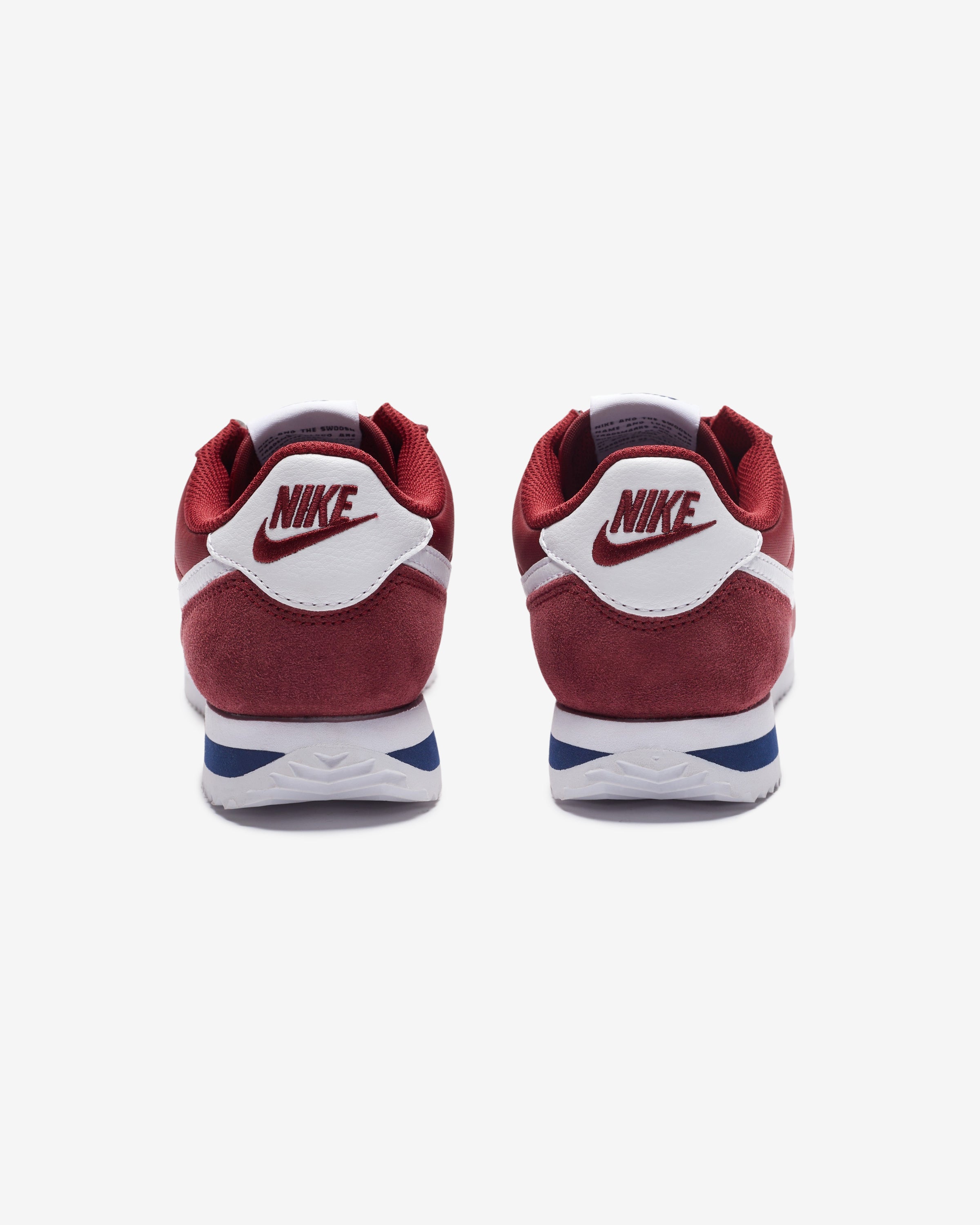 NIKE WOMEN'S CORTEZ - TEAMRED/ OBSIDIAN â Undefeated